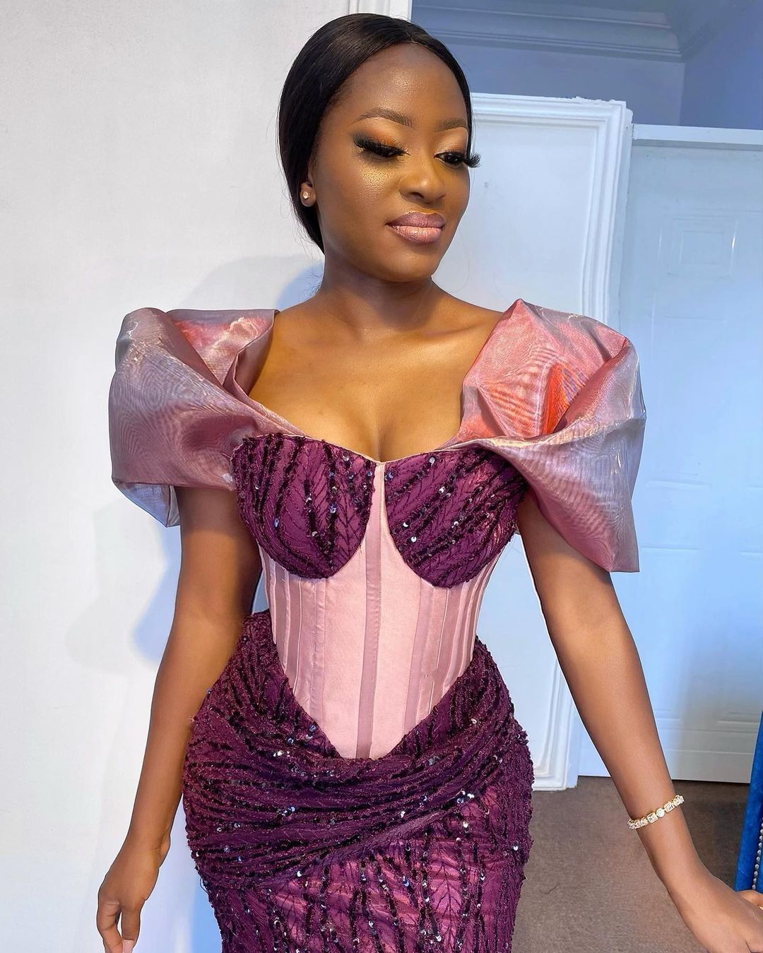 Zemphanie (Clothing Brand)’s Instagram photo: “Describe this dress in one word  @timkaay wedding guest totally rocked this corset dress from us  Dress @zemphanie  Makeup @kachiglam”